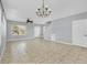 Spacious living room with large windows and neutral wall color at 5532 River Sound Ter, Bradenton, FL 34208
