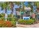 Community playground with modern equipment, set amongst lush greenery and shade trees at 5532 River Sound Ter, Bradenton, FL 34208