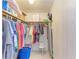 Efficiently organized closet with clothing, shelves, and storage solutions for optimal space utilization at 5619 Bayshore Rd # 152, Palmetto, FL 34221
