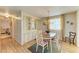 Cozy dining area features a charming chandelier and ample natural light at 5619 Bayshore Rd # 152, Palmetto, FL 34221
