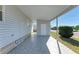 Covered carport shows a single story home with storage space and a manicured lawn at 5619 Bayshore Rd # 152, Palmetto, FL 34221