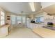 Bright kitchen with breakfast table, white appliances, and ample natural light at 5619 Bayshore Rd # 152, Palmetto, FL 34221