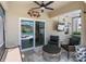 Inviting outdoor patio with view of sparkling pool and serene lounging space at 5868 Calla Lilly Dr, Sarasota, FL 34232