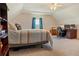 Bedroom featuring a bed, ceiling fan, carpet flooring, desk, and large window at 5949 225Th E St, Bradenton, FL 34211