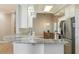 Kitchen featuring marbled countertops, stainless steel appliances, and a connected breakfast nook at 5949 225Th E St, Bradenton, FL 34211