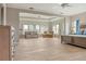 Spacious main bedroom with tile floors, neutral tones and plenty of natural light at 5949 225Th E St, Bradenton, FL 34211