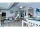Open floor plan features a living room, dining area, and modern kitchen at 767 Pine Run Dr, Osprey, FL 34229