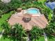 Overhead view of the building showing the swimming pool, ample deck and lounge area at 8142 Miramar Way # 71, Lakewood Ranch, FL 34202