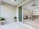 The covered patio provides seamless indoor/outdoor living with access to an open floor plan at 8142 Miramar Way # 71, Lakewood Ranch, FL 34202