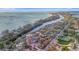 Beautiful waterfront property with lush surroundings, offering serene coastal living and stunning ocean views at 8555 Heron Lagoon Cir, Sarasota, FL 34242