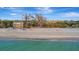This bright house provides easy access to the beach at 8555 Heron Lagoon Cir, Sarasota, FL 34242
