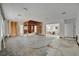 Large living room with exposed wall studs ready for customization with the buyer's personal design touches at 8555 Heron Lagoon Cir, Sarasota, FL 34242