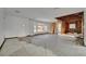 Spacious living room area offering a blank canvas for renovation and customization with natural light at 8555 Heron Lagoon Cir, Sarasota, FL 34242