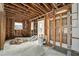 Partially renovated room featuring exposed wall studs, ideal for custom design and personalization at 8555 Heron Lagoon Cir, Sarasota, FL 34242