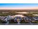 An aerial view of the luxury home showcasing the water view and community layout at 9241 Starry Night Ave, Sarasota, FL 34241