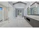 Bright, spacious bathroom with double vanity, soaking tub and glass enclosed shower at 9241 Starry Night Ave, Sarasota, FL 34241