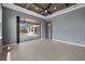 Bedroom with sliding doors to a screened in pool at 9241 Starry Night Ave, Sarasota, FL 34241