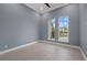 Bright room with tiled floors featuring two windows providing a clear outdoor view at 9241 Starry Night Ave, Sarasota, FL 34241