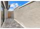 Exterior patio area of the home featuring pavers and a gate at 9241 Starry Night Ave, Sarasota, FL 34241