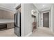 Mudroom with a refrigerator and custom storage at 9241 Starry Night Ave, Sarasota, FL 34241