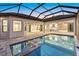 Beautiful pool and patio area with an open-concept home design at 9241 Starry Night Ave, Sarasota, FL 34241