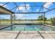 The pool and spa are enclosed and screened with a beautiful lake view at 9241 Starry Night Ave, Sarasota, FL 34241
