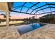 Gorgeous pool area with screened enclosure and a lovely lake view at 9241 Starry Night Ave, Sarasota, FL 34241