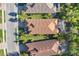 Birds-eye view shows a well-landscaped community with lush greenery and tidy homes at 9914 Craftsman Park Way, Palmetto, FL 34221
