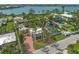 Aerial view of the property showcasing the home, pool and surrounding area at 107 Nippino W Trl, Nokomis, FL 34275
