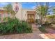 Inviting front entrance with ornate wooden door, tile roof, and decorative details at 107 Nippino W Trl, Nokomis, FL 34275