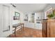 Office space with built-in shelving and terracotta tile flooring at 107 Nippino W Trl, Nokomis, FL 34275