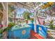 Charming outdoor bar area with a unique, colorful design and a relaxing, tropical atmosphere at 107 Nippino W Trl, Nokomis, FL 34275