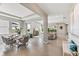 Open-concept living space seamlessly connecting dining and Gathering areas with abundant natural light at 10717 Tippecanoe Pl, Parrish, FL 34219