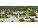 An aerial view of the community clubhouse, showcasing its well-maintained grounds and inviting facade at 11021 Blue Magnolia Ln, Parrish, FL 34219