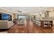 Spacious open-concept living area combining the kitchen, dining, and living spaces, perfect for entertaining at 11176 Roseate Ct, Sarasota, FL 34238
