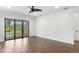 Spacious bedroom with natural light and sliding glass door to patio at 11214 Sandhill Preserve Dr, Sarasota, FL 34238