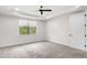 Bright bedroom features natural light and tray ceiling at 11214 Sandhill Preserve Dr, Sarasota, FL 34238