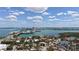 Stunning aerial view of the home in a waterfront community with city skyline backdrop at 113 Fillmore Dr, Sarasota, FL 34236