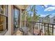 This cozy balcony offers a charming view with a quaint table and chairs at 113 Fillmore Dr, Sarasota, FL 34236