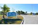 Entrance to Lido Beach Pool & Pavilion amenities center complete with a sign showcasing pool and other community information at 113 Fillmore Dr, Sarasota, FL 34236