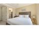This inviting main bedroom offers serene decor with an adjoining bathroom at 113 Fillmore Dr, Sarasota, FL 34236