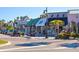 Street view showcasing several storefronts including Mini Donuts coffee and expresso shop at 113 Fillmore Dr, Sarasota, FL 34236
