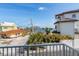 Scenic view from the property showcasing neighboring homes and the ocean waters at 117 7Th N St # 35, Bradenton Beach, FL 34217