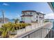 Waterfront home with a multi-story design, featuring multiple balconies and a tiled roof at 117 7Th N St # 35, Bradenton Beach, FL 34217
