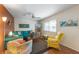 Bright living room with themed decorations and comfortable seating arrangements at 117 7Th N St # 35, Bradenton Beach, FL 34217
