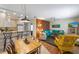 Bright living room with island themed decorations and an open floor plan at 117 7Th N St # 35, Bradenton Beach, FL 34217