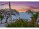 Beautiful water view with trees and foliage; gorgeous twilight colors fill the horizon at 117 7Th N St # 35, Bradenton Beach, FL 34217
