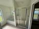 Bright bathroom featuring a tiled shower, soaking tub, and a vanity at 11811 53Rd Ct E, Parrish, FL 34219