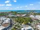 Breathtaking aerial view of a coastal community with a park and the ocean at 1186 Center Pl, Sarasota, FL 34236