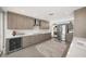 Contemporary kitchen featuring stainless steel appliances, sleek cabinetry, and an open design for modern living at 1186 Center Pl, Sarasota, FL 34236